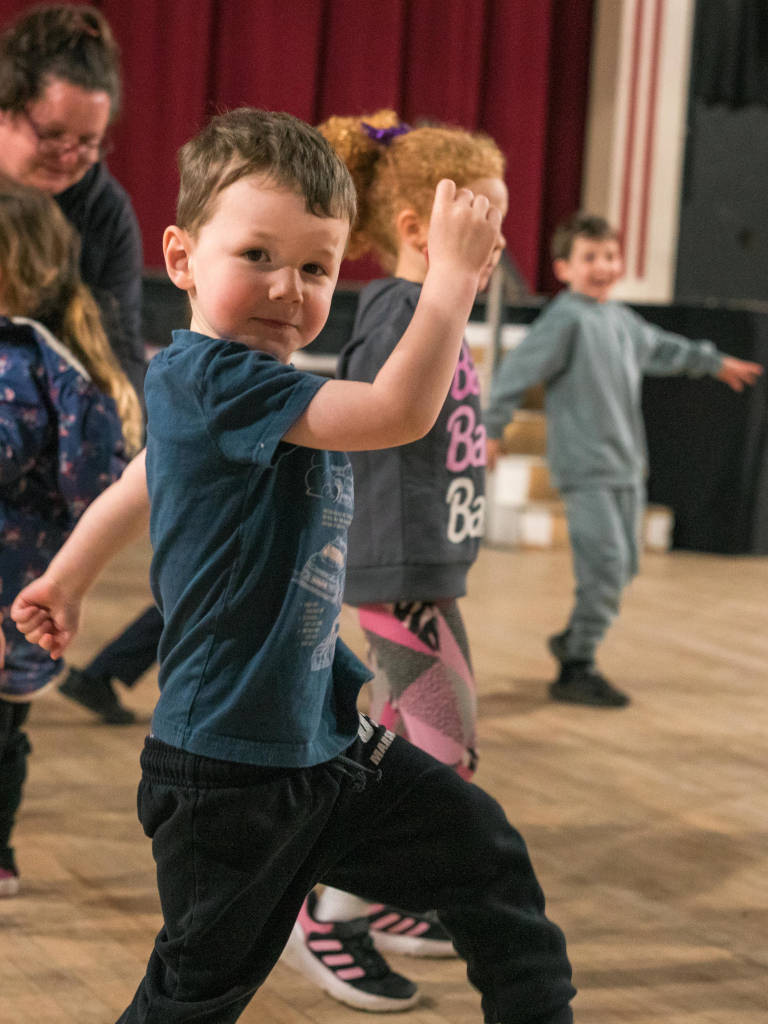 Children performing on stage at acting school in Clitheroe, Lancashire